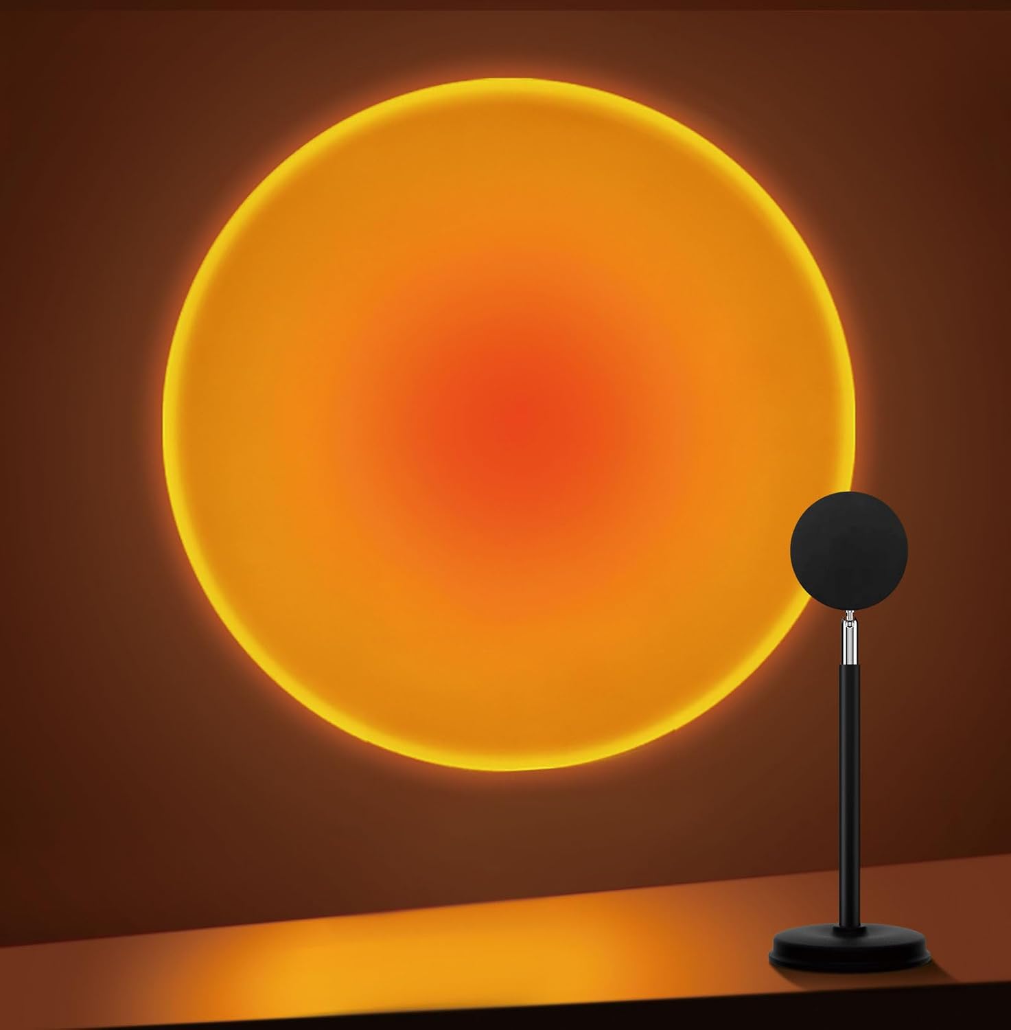Tsrarey sunset projection lamp casting an orange halo on a wall